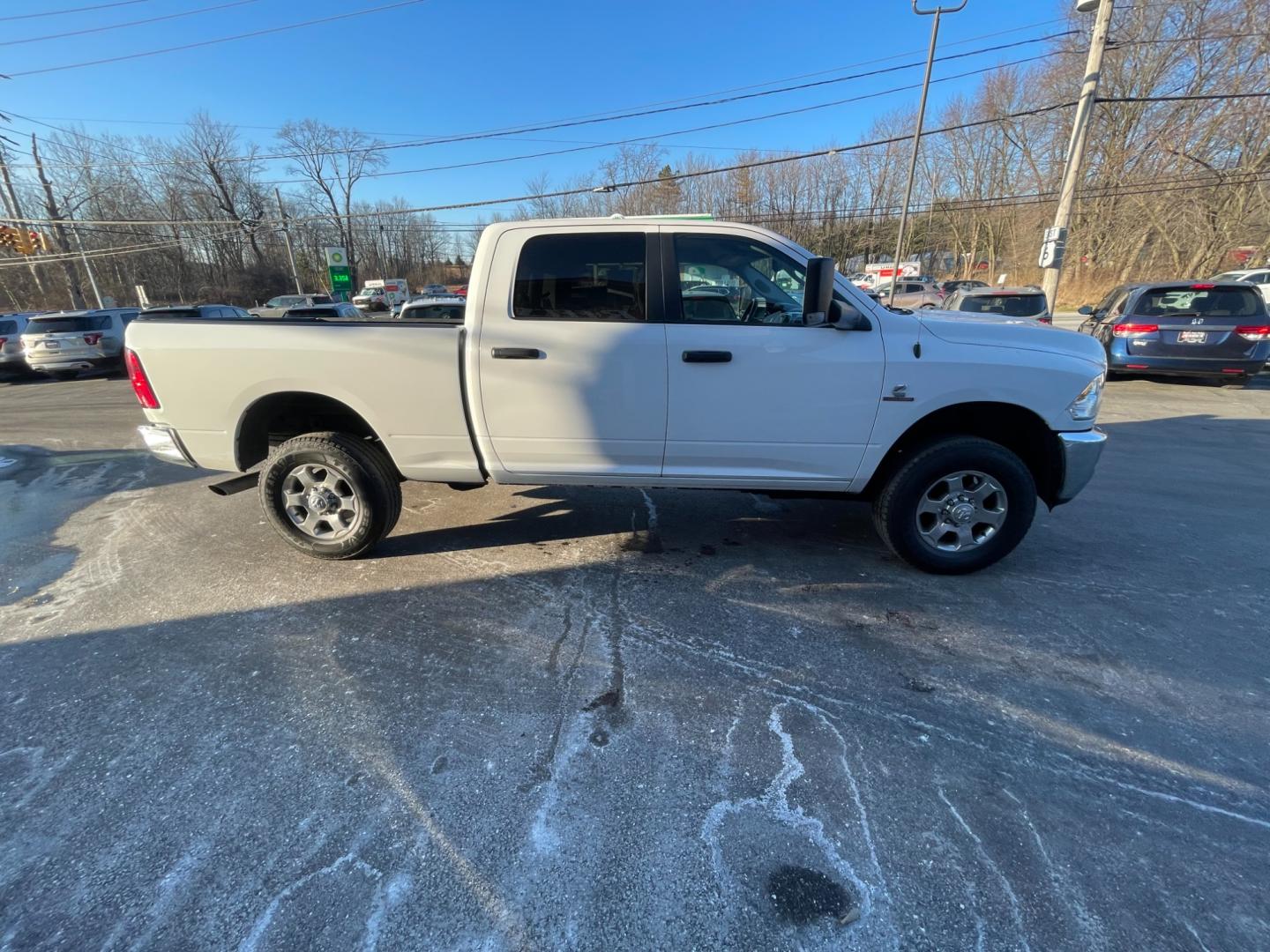 2016 White /Black RAM 2500 Outdoorsman Crew Cab SWB 4WD (3C6UR5DL4GG) with an 6.7L I6 OHV 24V TURBO DIESEL engine, 6A transmission, located at 11115 Chardon Rd. , Chardon, OH, 44024, (440) 214-9705, 41.580246, -81.241943 - Photo#6